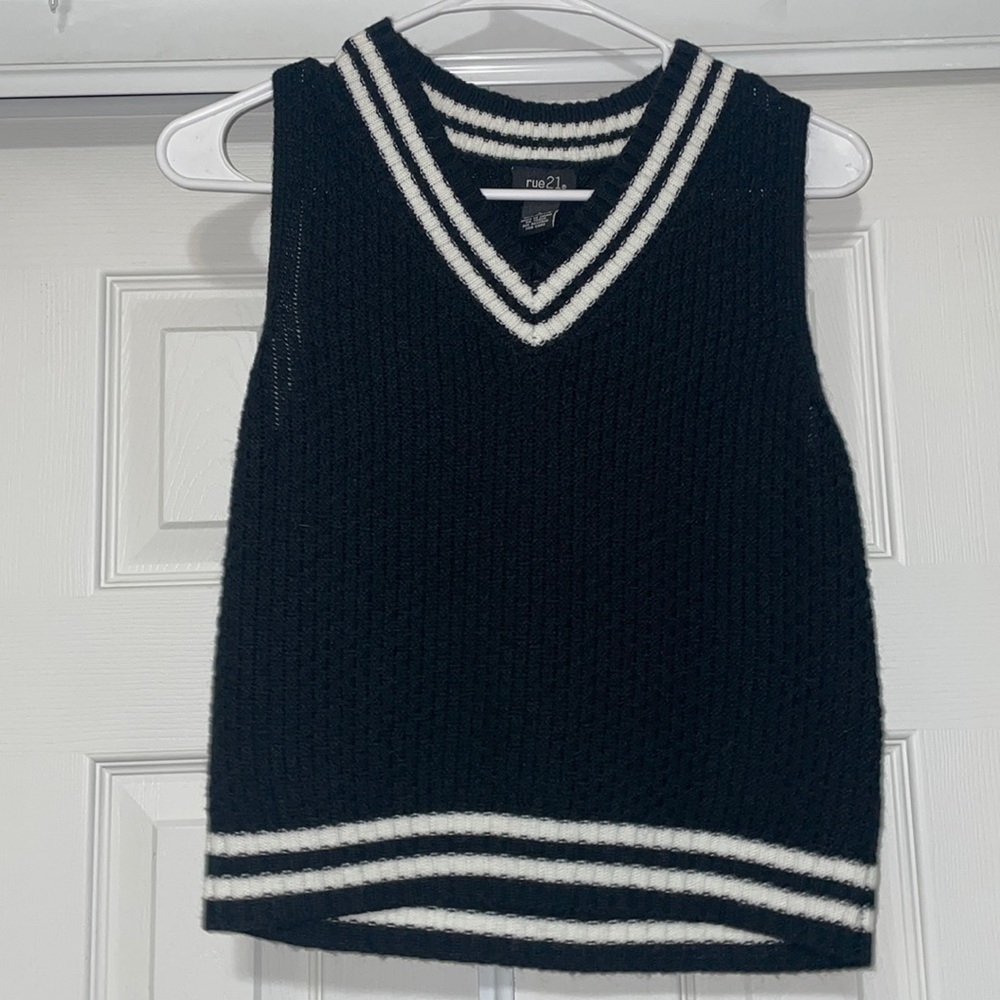 V-neck Rue 21 sweater. Super cute and soft just don’t wear